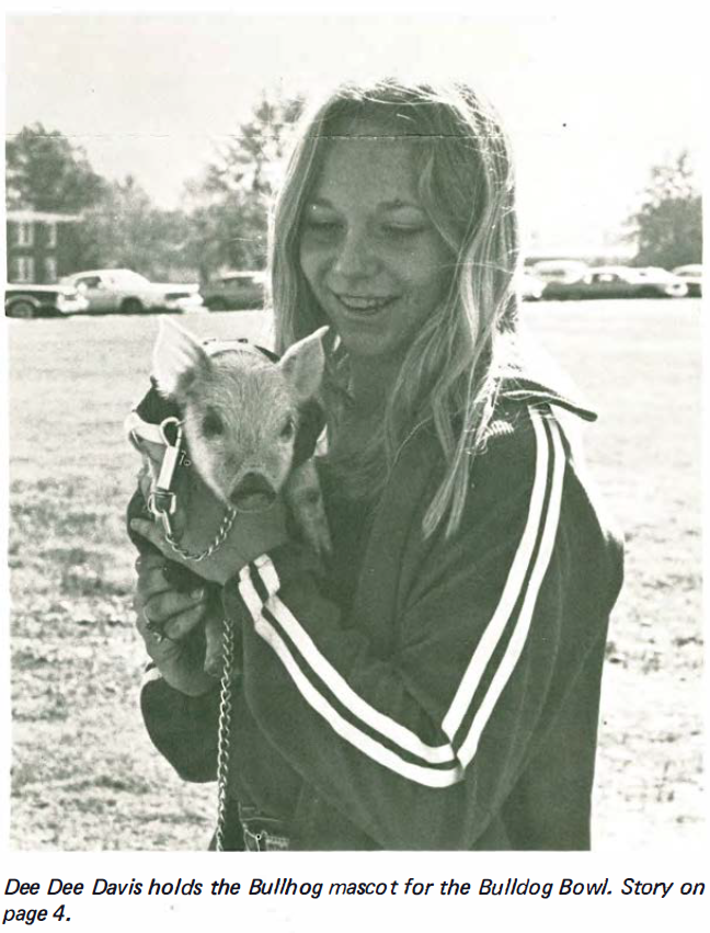 Dee Dee Davis holding the Bullhog mascot.